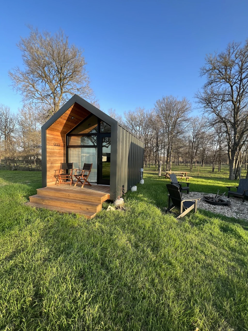 Hand-crafted gable cabin at golden hour at Rancho Moonrise