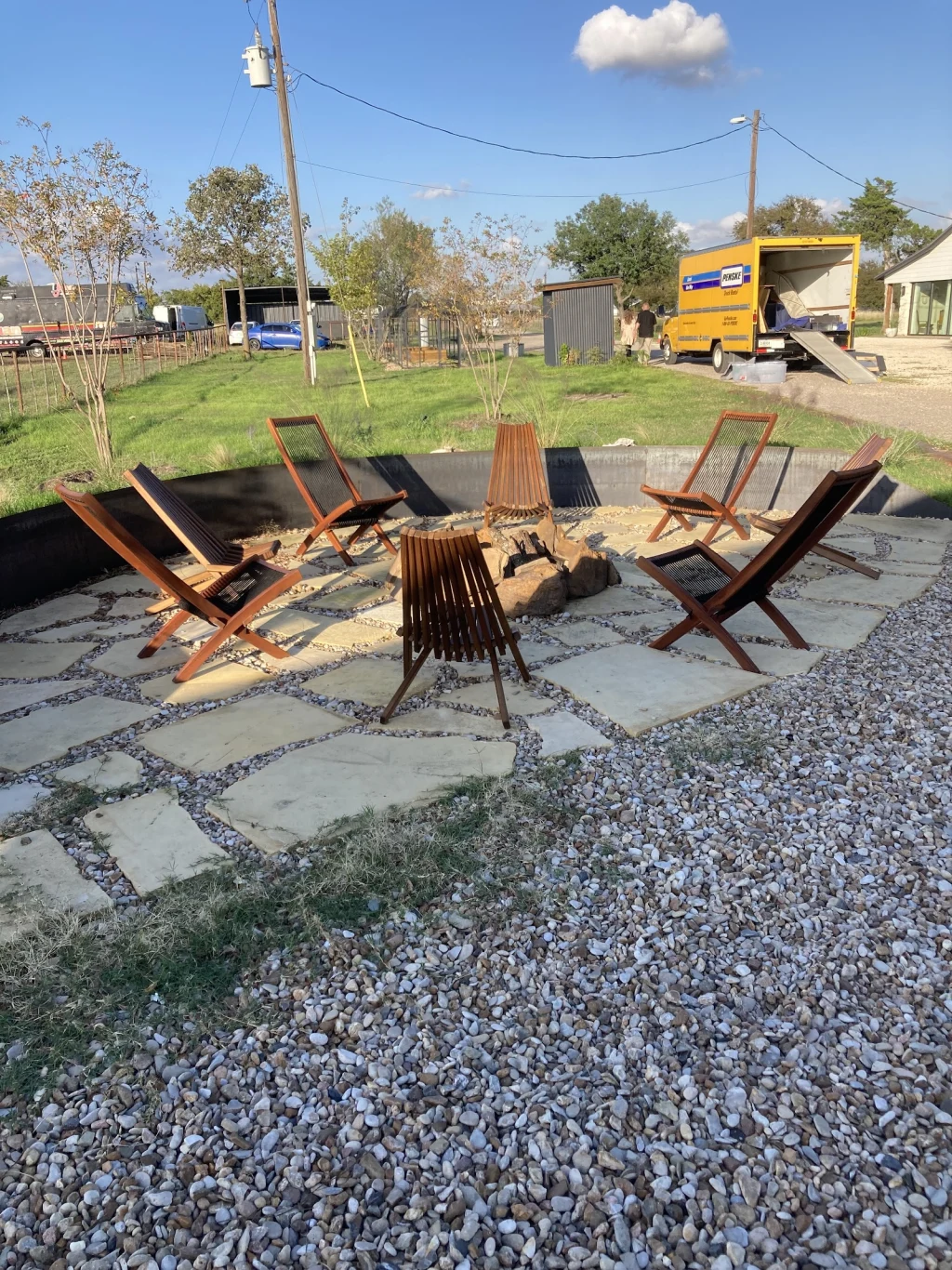 Firepit circle with Adirondack chairs on flagstone at Rancho Moonrise