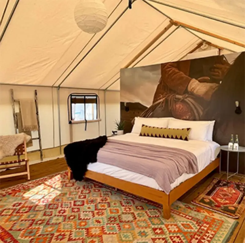 Premium safari tent with king bed and private ensuite bathroom at Rancho Moonrise