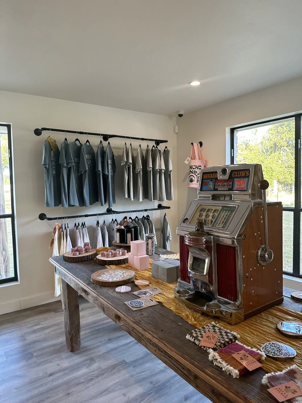 Vintage slot machine on a rustic table in The Lodge shop