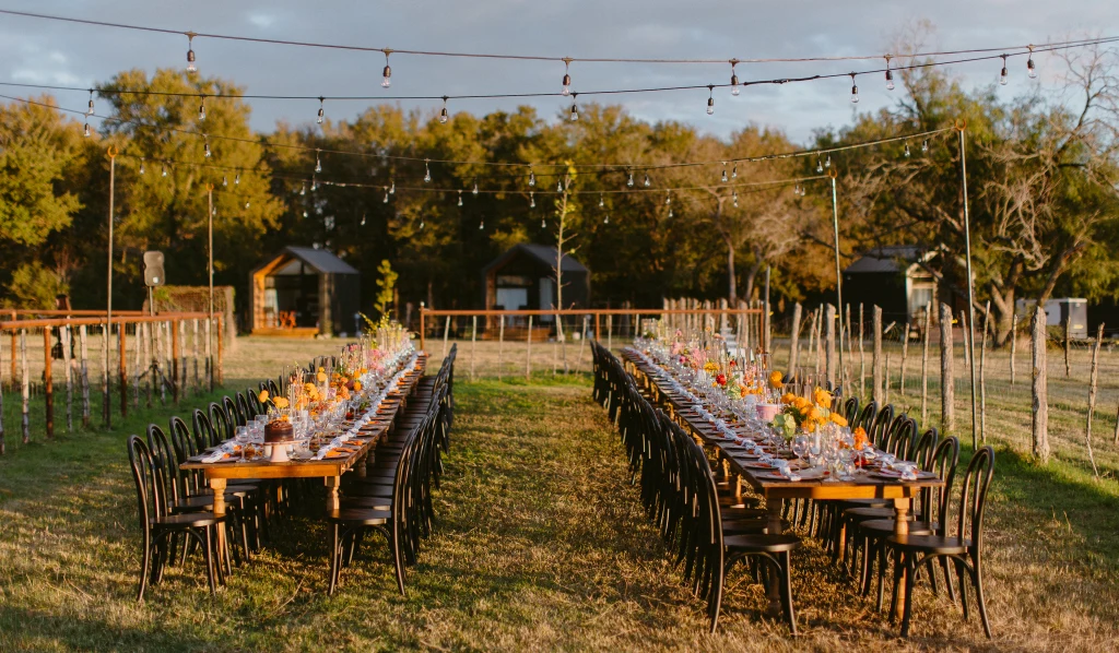 Wedding couple at golden-hour sunset on the ranch